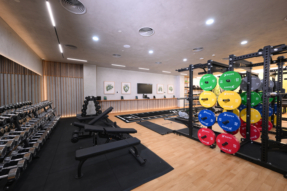 Free weights and dumbbell racks at Fitty